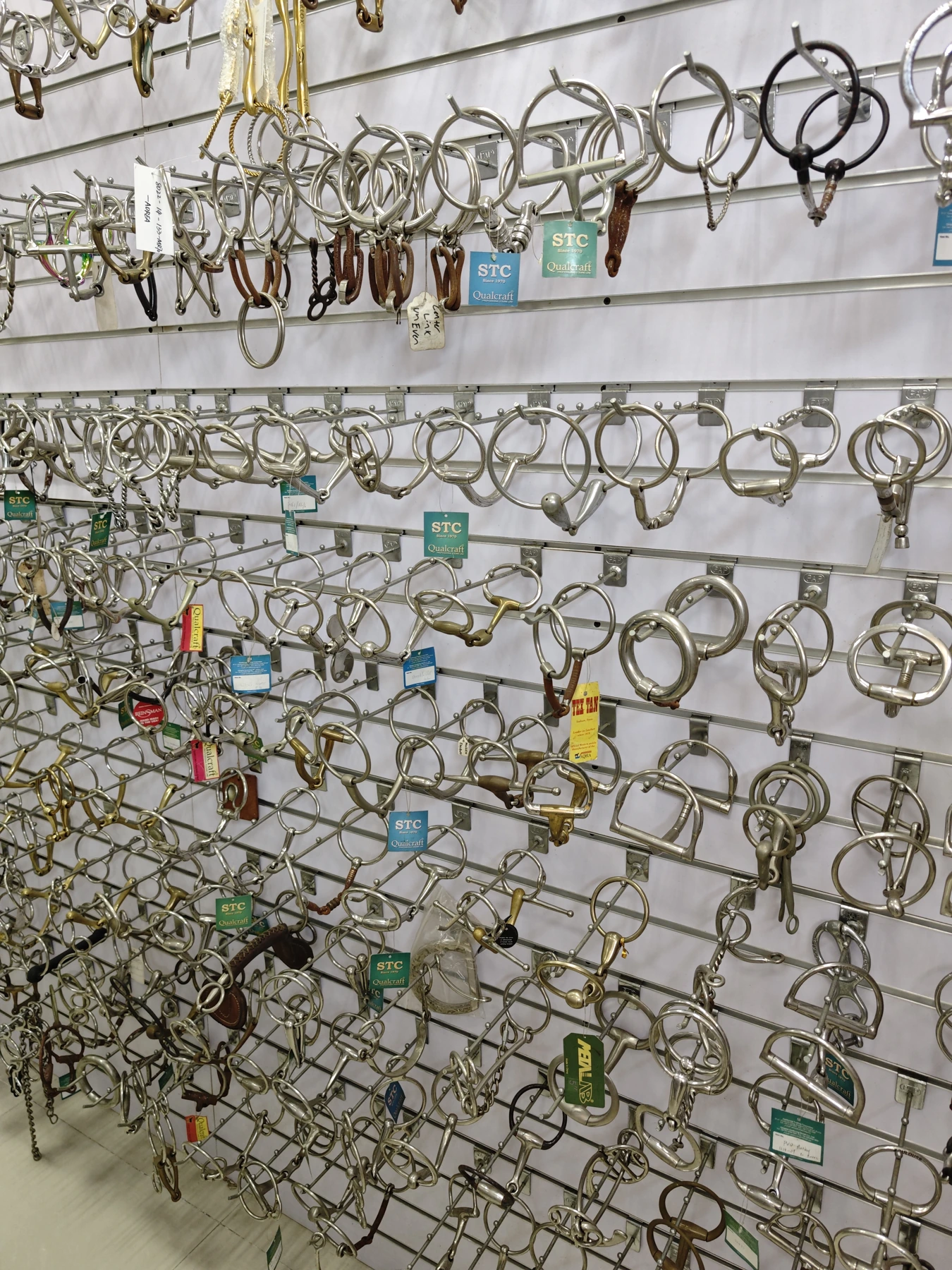 Horse-bit samples showing a variety of rings, cheeks and mouthpiece forms.