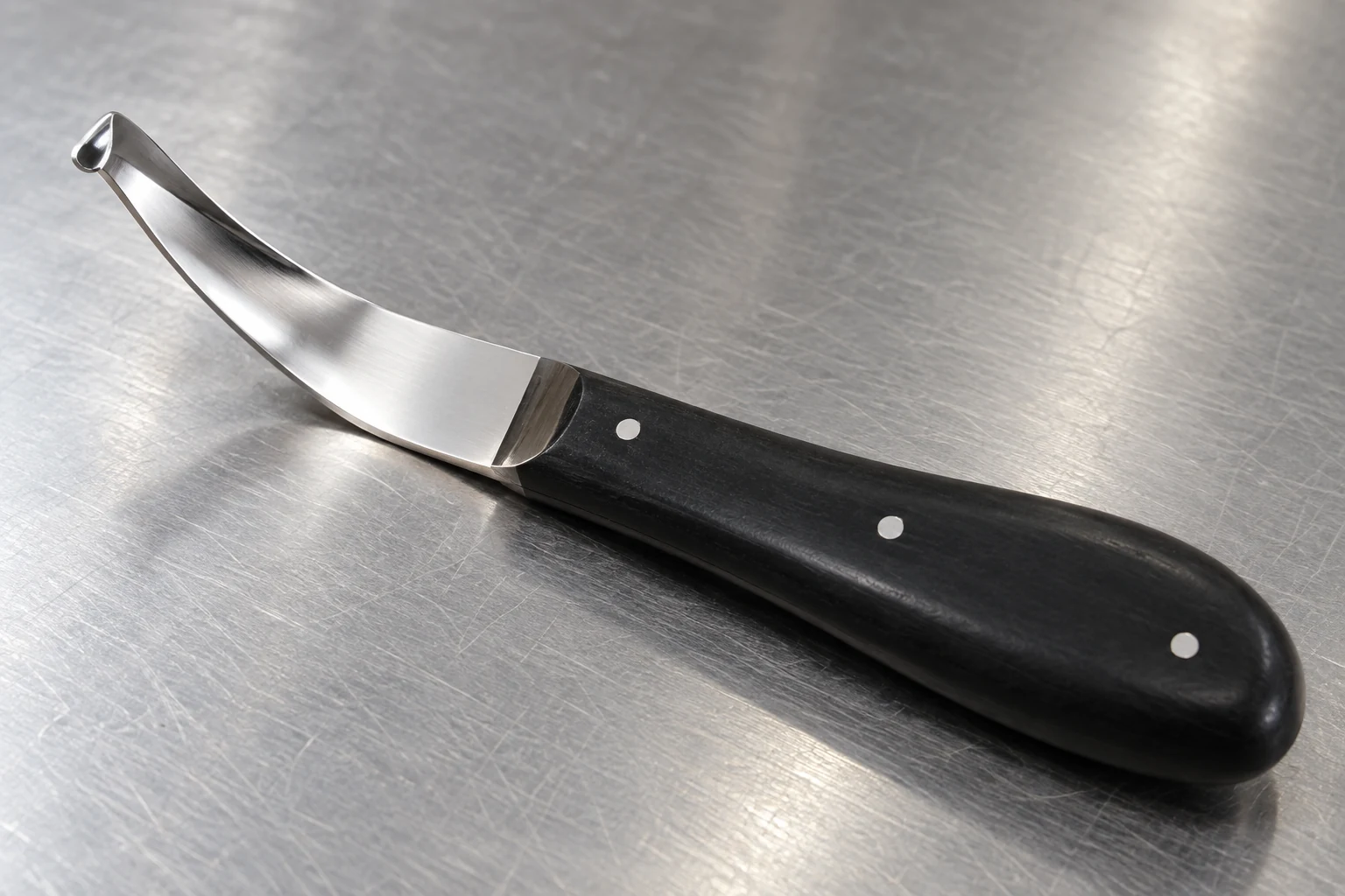 Hoof knife blade and handle connection shown close up