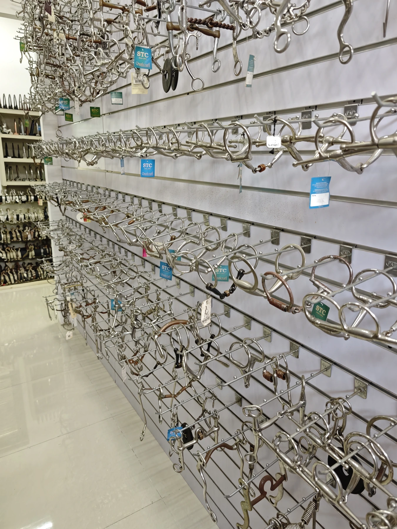 Horse-bit samples displayed in the sample room.
