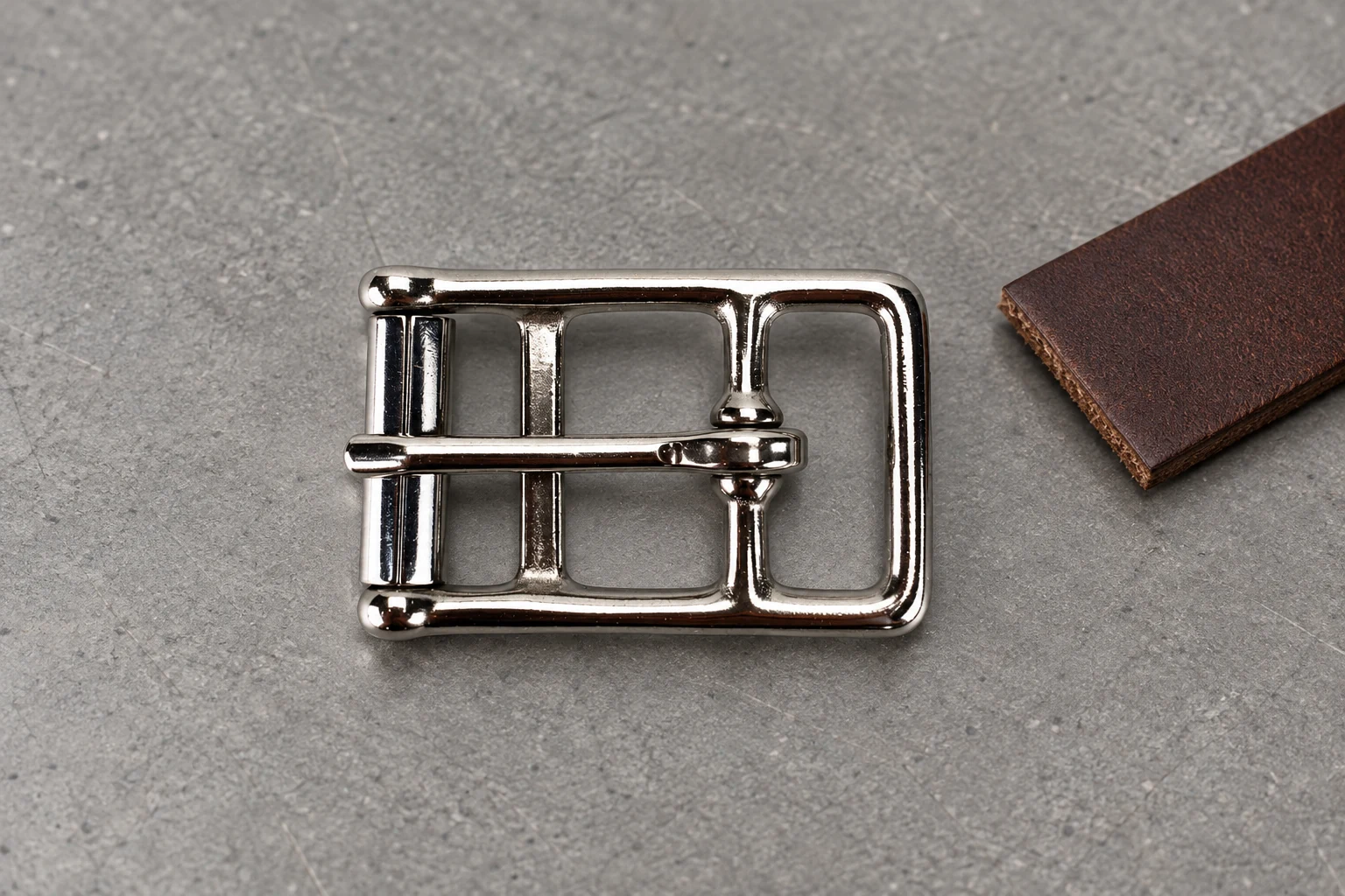 Roller buckle frame and tongue shown in close detail